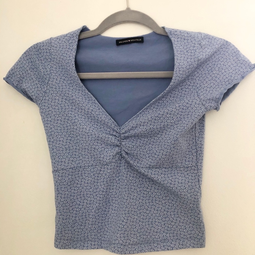 blue brandy melville gina top with white flowers